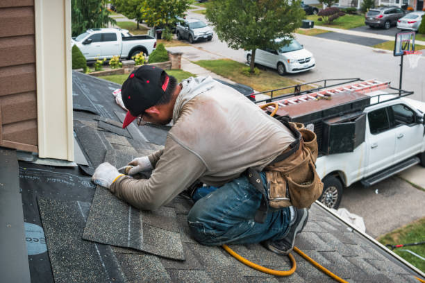 Professional Roofing technician working in White Plains, NC